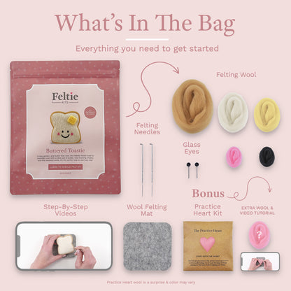 What comes in the Feltie Kits Buttered Toastie needle felting kit, including wool, needles, eyes, felting mat, practice heart, and video tutorial.