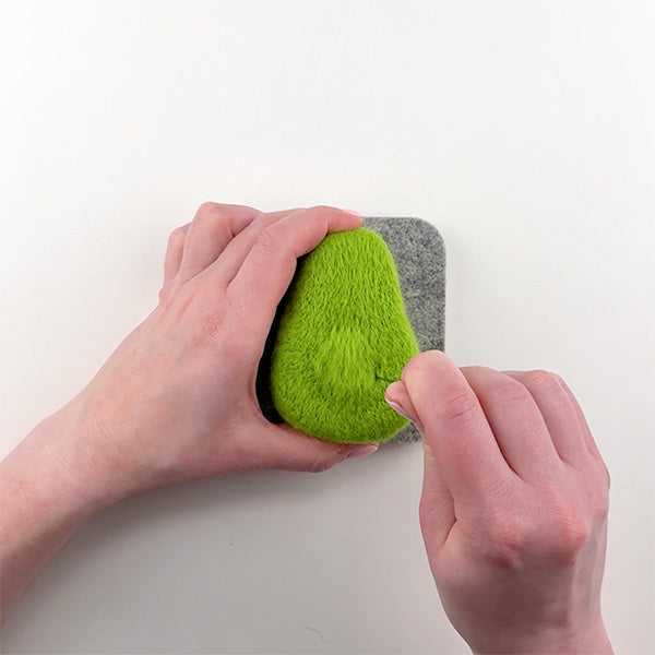 Step-by-step Perfect Avocado needle felting tutorial from Feltie Kits, showing how to create room for the pit.