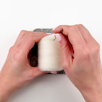 Step-by-step Salmon Sushi needle felting tutorial from Feltie Kits, showing how to shape the rice body.