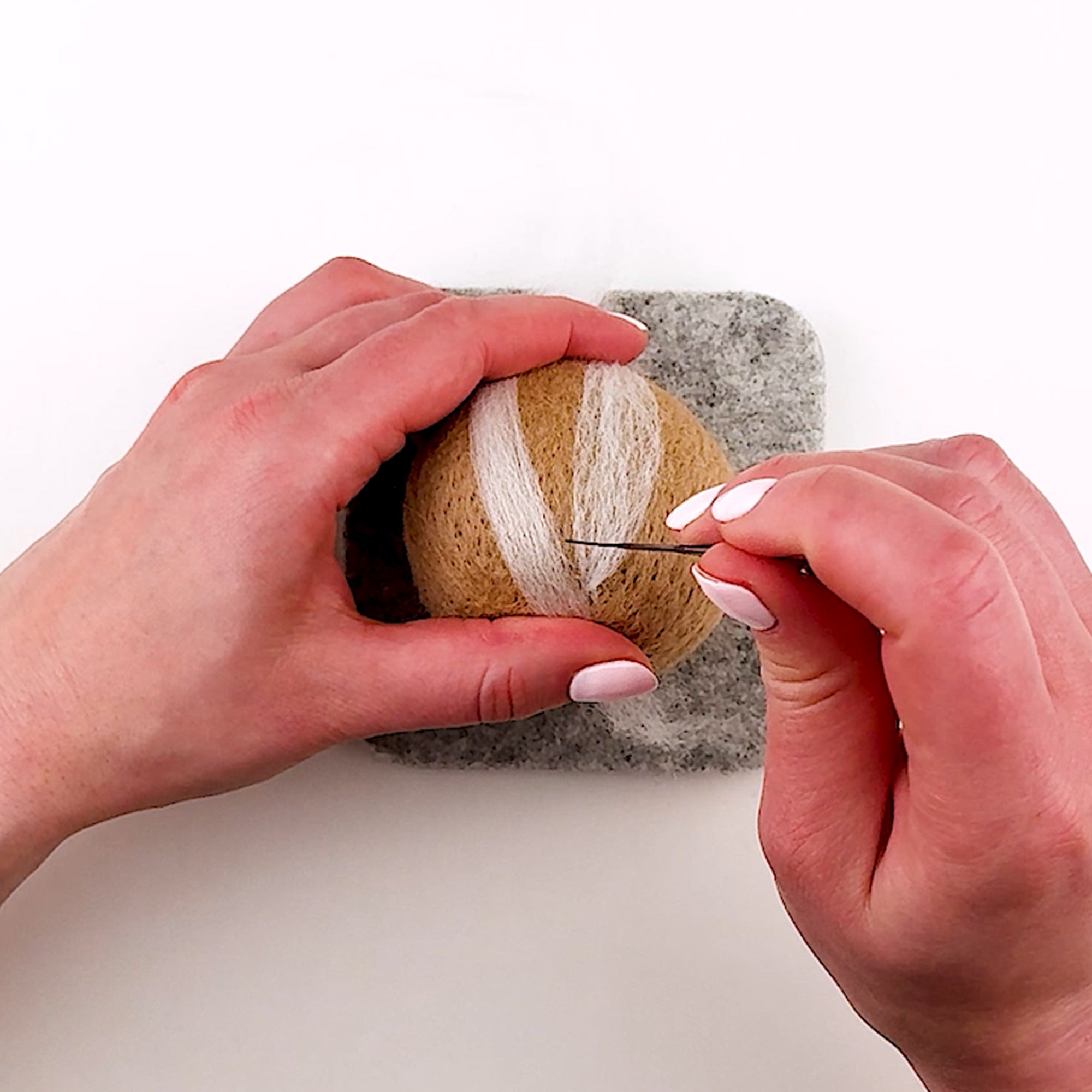Step-by-step Sourdough needle felting tutorial from Feltie Kits, showing how to add the scoring.